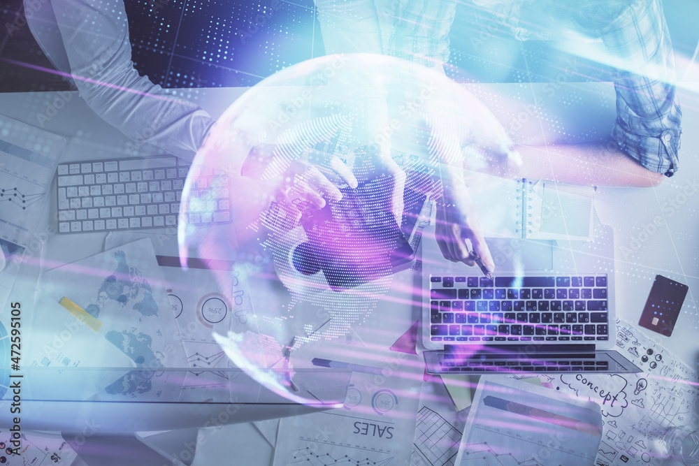 Double exposure of man and woman working together and technology theme drawing. Computer background. Top View. High tech concept. Double exposure of man and woman working together and technology theme drawing. Computer background. Top View. High tech concept.