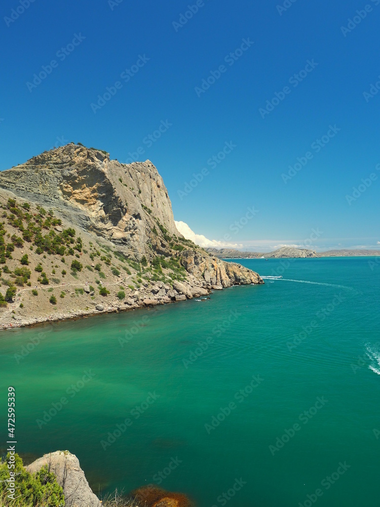 AT THE JUNCTION OF THE MOUNTAINS AND THE SEA