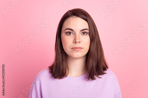 Photo of young lovely lady confident serious smart agent wear casual clothes isolated over pink color background