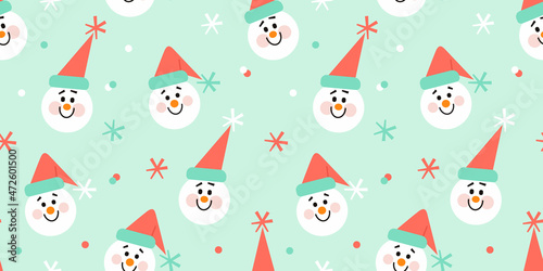Seamless vector pattern with cute snowmen and snowflakes. Funny colorful winter pattern. Winter festive background for print, wrapping paper, textile, etc.