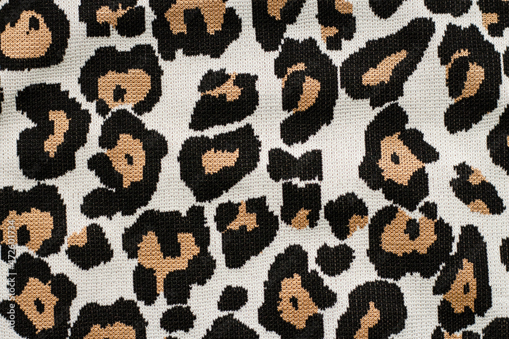 Animal print, leopard pattern fabric background in brown colors. High quality photo Animal print, leopard pattern fabric background in brown colors. High quality photo