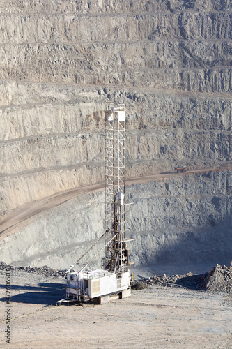 Blasthole drill in an open pit copper mine operation in Chile photo