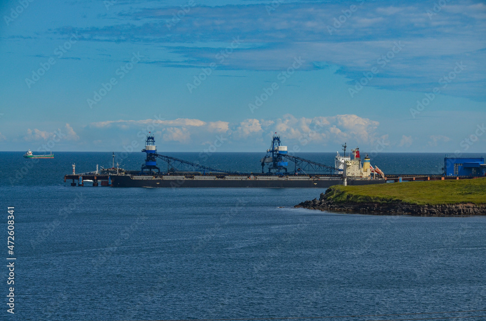 bulk ship loading at coal terminal in Vanino harbor (Khabarovsky krai, Russia)