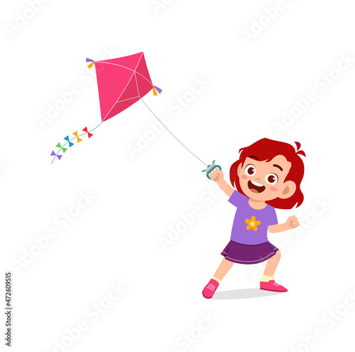 cute little girl play kite outside and feel happy