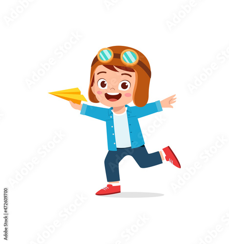 cute little boy play paper plane and feel happy