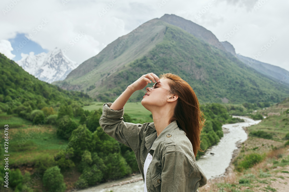 woman hiker mountains landscape travel fresh air
