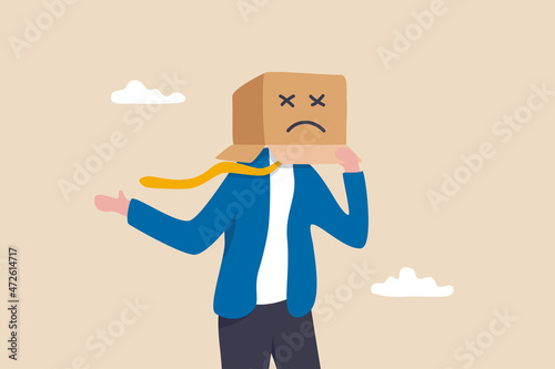 Unhappy employee or unsatisfied customer, depressed from overworked or business failure, anxiety or stressed from work, frustrated businessman covered with cardboard box with unhappy sad face.