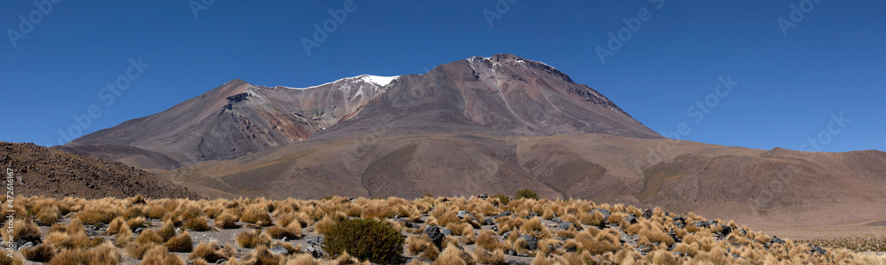 Large panorama of an extinct volcano with reflection in the water in Bolivia Large panorama of an extinct volcano with reflection in the water in Bolivia