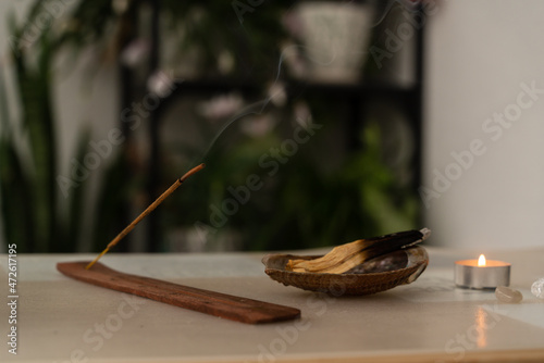 Smolding aromatic olibanum stick. Tranquil incense relaxation. Home aromatherapy. Spiritual ritual