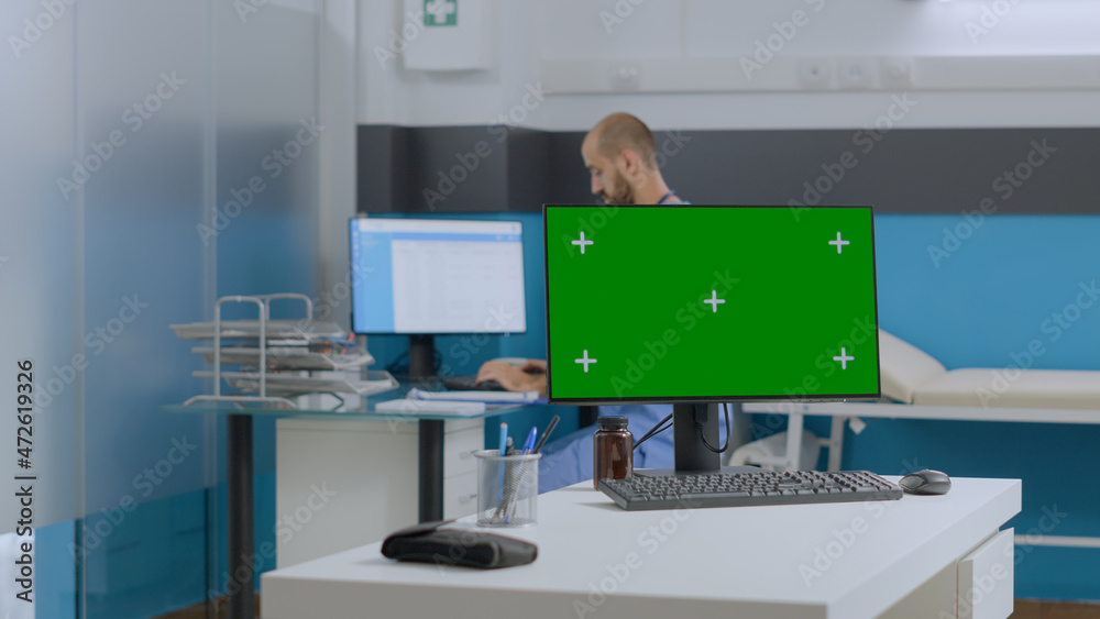 Multi-ethnic team discussing sickness symptoms analyzing medical document working at healthcare treatment in hospital office. Mock up green screen chroma key computer with isolated display Multi-ethnic team discussing sickness symptoms analyzing medical document working at healthcare treatment in hospital office. Mock up green screen chroma key computer with isolated display