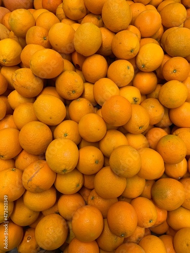 lots of ripe orange for eating as background