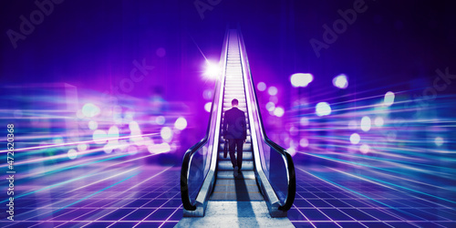 Businessman climbing stairs in the metaverse photo