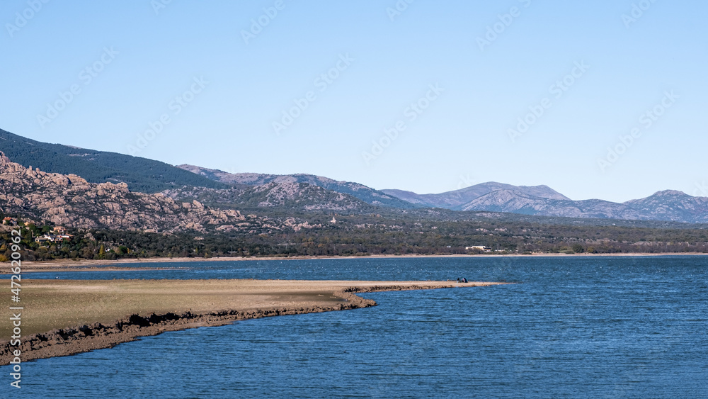 Lake and mountains Landescape. 
Santillana reservoir in Manzanares el Real, Madrid, Spain, Europe