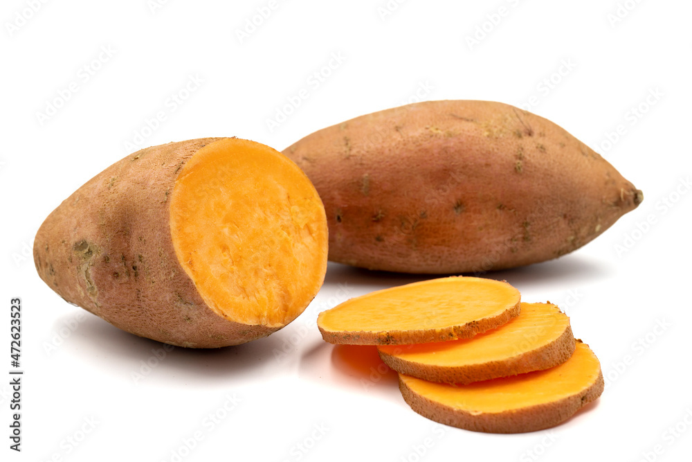 sweet potatoes on a white background. Sliced sweet potato. horizontal view. close up sweet potatoes on a white background. Sliced sweet potato. horizontal view. close up