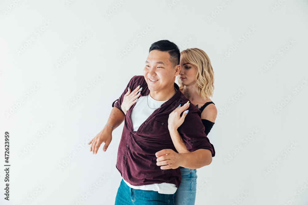 Naklejka premium a man and a woman dance to the music of a pair dance of bachata