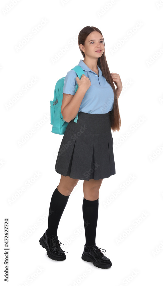Teenage girl in school uniform with backpack on white background Teenage girl in school uniform with backpack on white background
