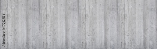 Sichtbetonwand in Holzoptik mit sich wiederholendem Muster in grau xxl panorama