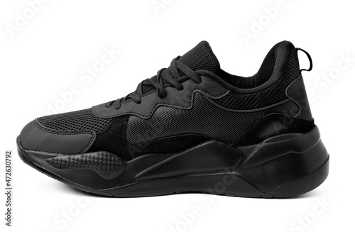 One black sneaker shoe isolated on white