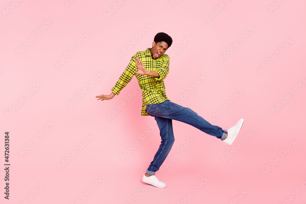 Full size photo of happy funky crazy afro american man dance enjoy smile isolated on pink color background