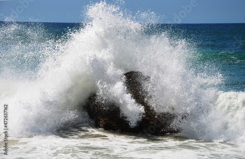Sea water splash against rock