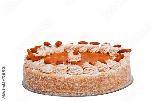 almond cream cake isolated on a white background.
