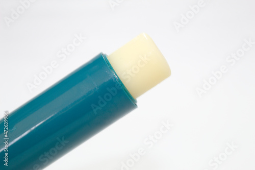 Cocoa butter for lips with green applicator