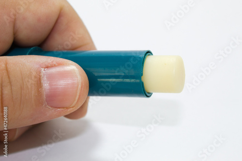 Cocoa butter for lips with green applicator