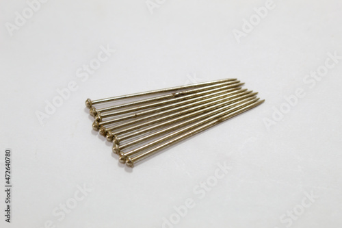 Metal pins with white background