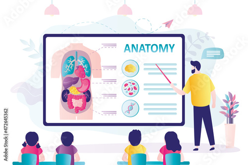 Teacher tells children about internal structure of human body. Anatomy lesson at school