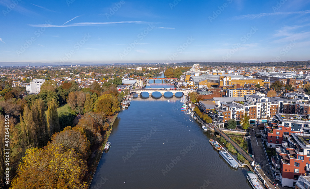 The drone aerial view of Kingston bridge across River Thames, and view of Kingston upon Thames, London.