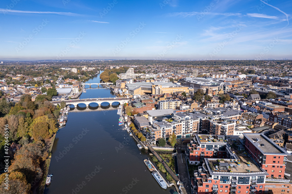 The drone aerial view of Kingston bridge across River Thames, and view of Kingston upon Thames, London.