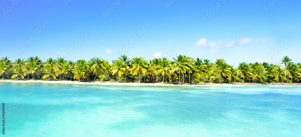 Light blue skies overlooking a marvelous island, situated amongst clear waters. Light blue skies overlooking a marvelous island, situated amongst clear waters.