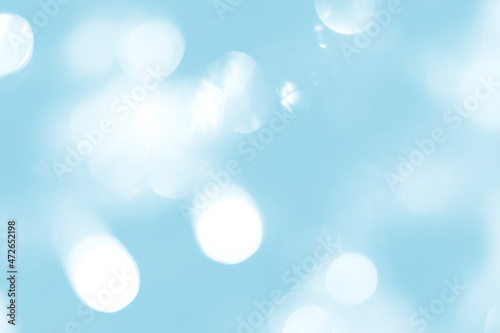 Blurred lights blue background. Abstract bokeh with soft light. Trendy color