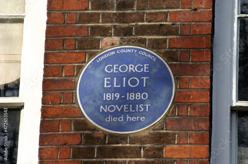 English Heritage blue plague on the wall of the house where the famous poet T.S Eliot lived and died.London, UK. photo