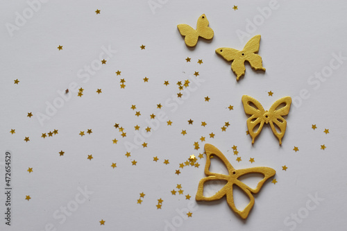 Variety of gold and pastel Butterflies Image in flatlay style. butterfly background. Different pastel colours. Christmas decoration. holiday. Top view flatlay . background for children's party. 
