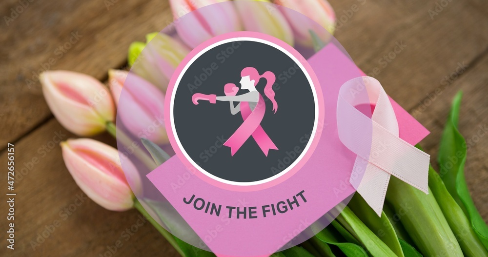Fototapeta premium Composite image of breast cancer awareness slogan over tulip flowers on table, copy space