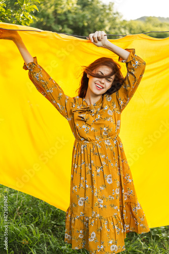 attractive woman outdoors hairstyle summer posing yellow background