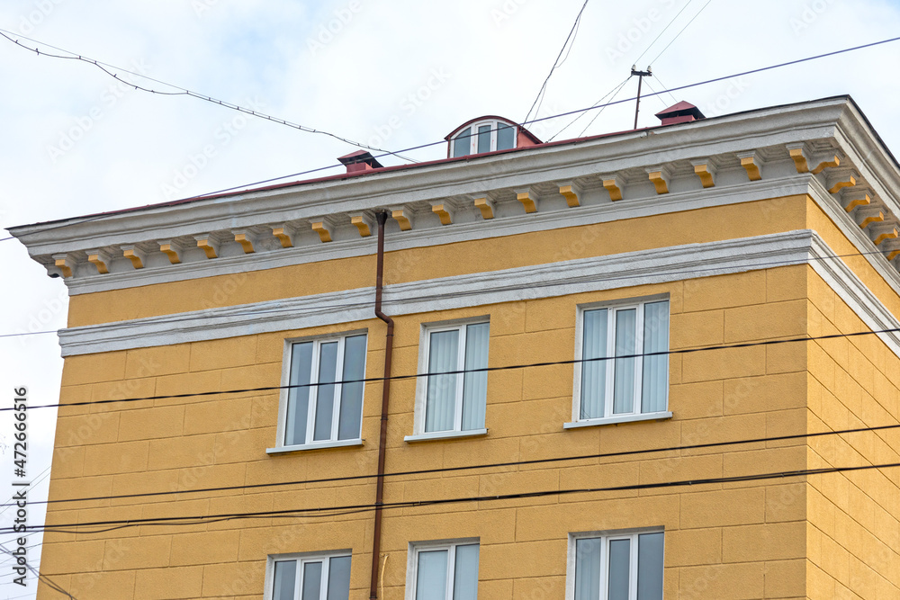 Yellow facade of a residential building