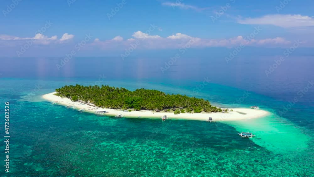 Summer beach landscape. Tropical island view, palm trees with amazing blue sea. Perfect beach scenery, white sand, exotic travel destination. Digyo Island, Philippines. Summer beach landscape. Tropical island view, palm trees with amazing blue sea. Perfect beach scenery, white sand, exotic travel destination. Digyo Island, Philippines.