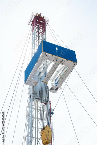 Mobile drilling rig close-up. Drilling and servicing oil and gas wells photo