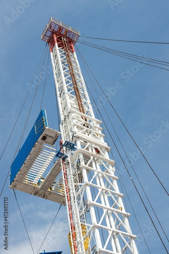 Mobile drilling rig close-up. Drilling and servicing oil and gas wells photo