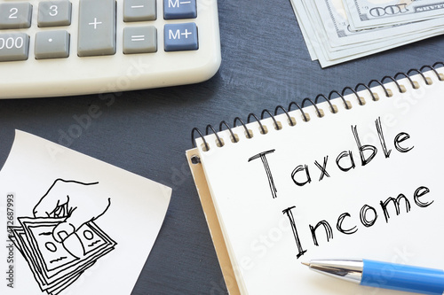Taxable Income is shown on the conceptual business photo using the text photo