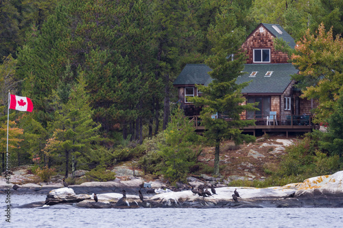 Canada, Ontario. Remote cabin on Lake Nawakan in Voyageurs National Park. photo
