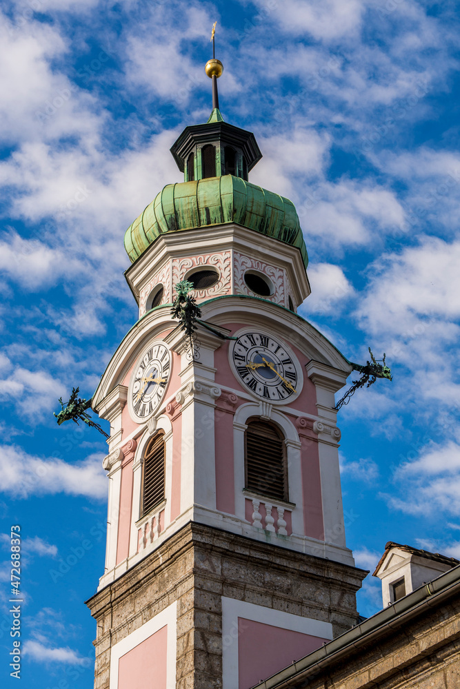Obraz premium The Spitalskirche or Hospital Church of the Holy Spirit, clock tower, Old Town, Innsbruck, Tyrol, Austria.