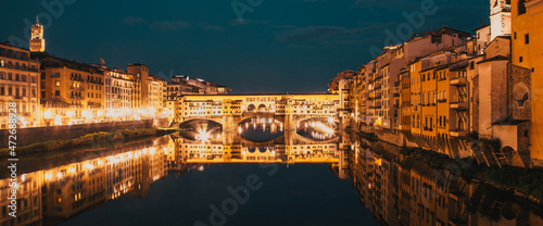 ponte Vecchio on river Arno at night, Florence, Italy