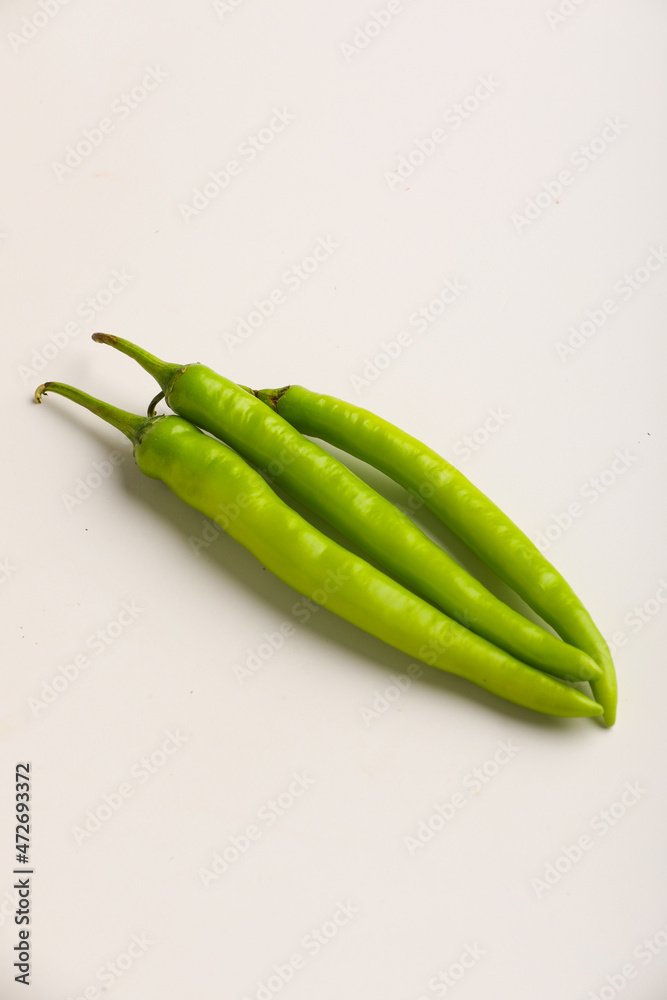 Fresh green chilli on white background. Fresh green chilli on white background.