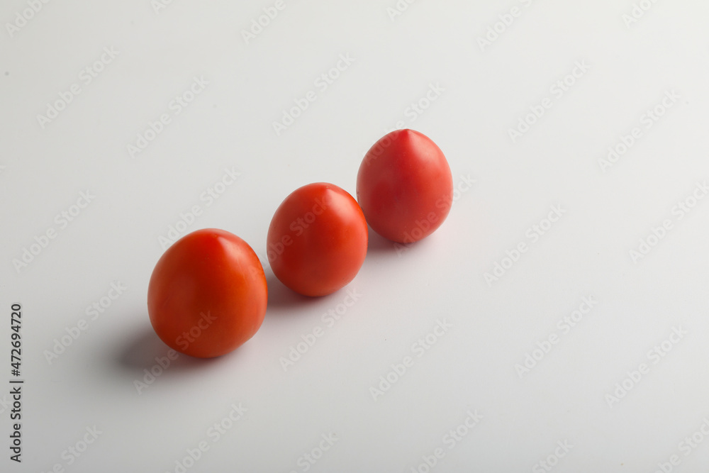 Fresh red tomato on white background. Fresh red tomato on white background.