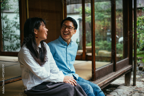 Photography Young japanese couple spending time in their house