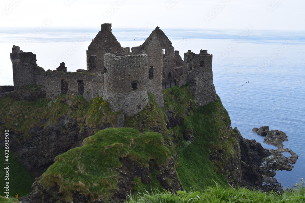 Ruins of a castle on the coastline of Northern Island