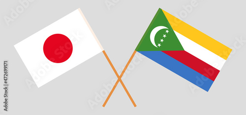 Crossed flags of Japan and the Comoros. Official colors. Correct proportion